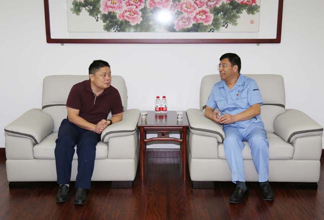 興業(yè)銀行洛陽(yáng)分行行長(zhǎng)張洪波一行到萬基控股洽談合作